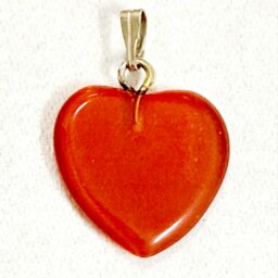 Liontin hati dari cat eye sintetis warna red orange